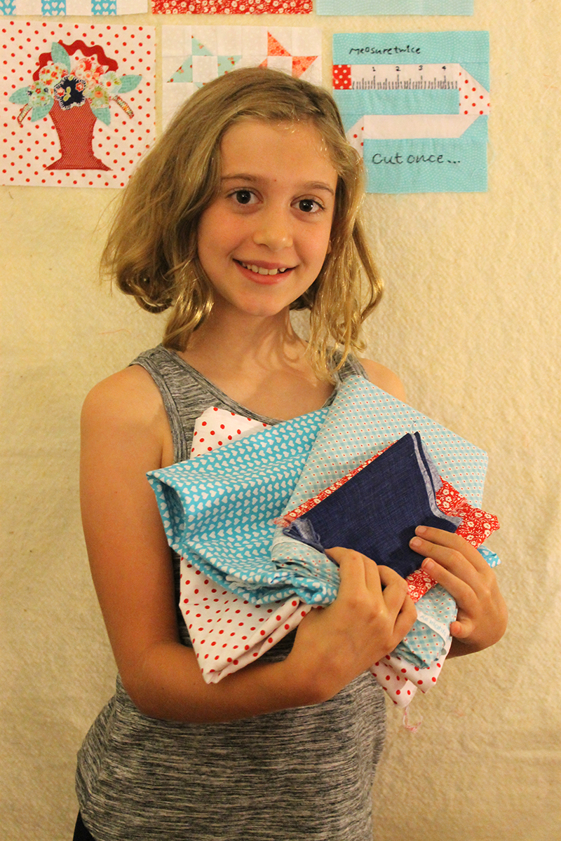 Addison with fabric for block 27, sewing machine
