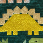 dinosaur quilt with free motion quilting